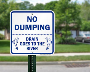 Drains to river sign