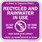 Recycled And Rainwater In Use Bilingual Sign